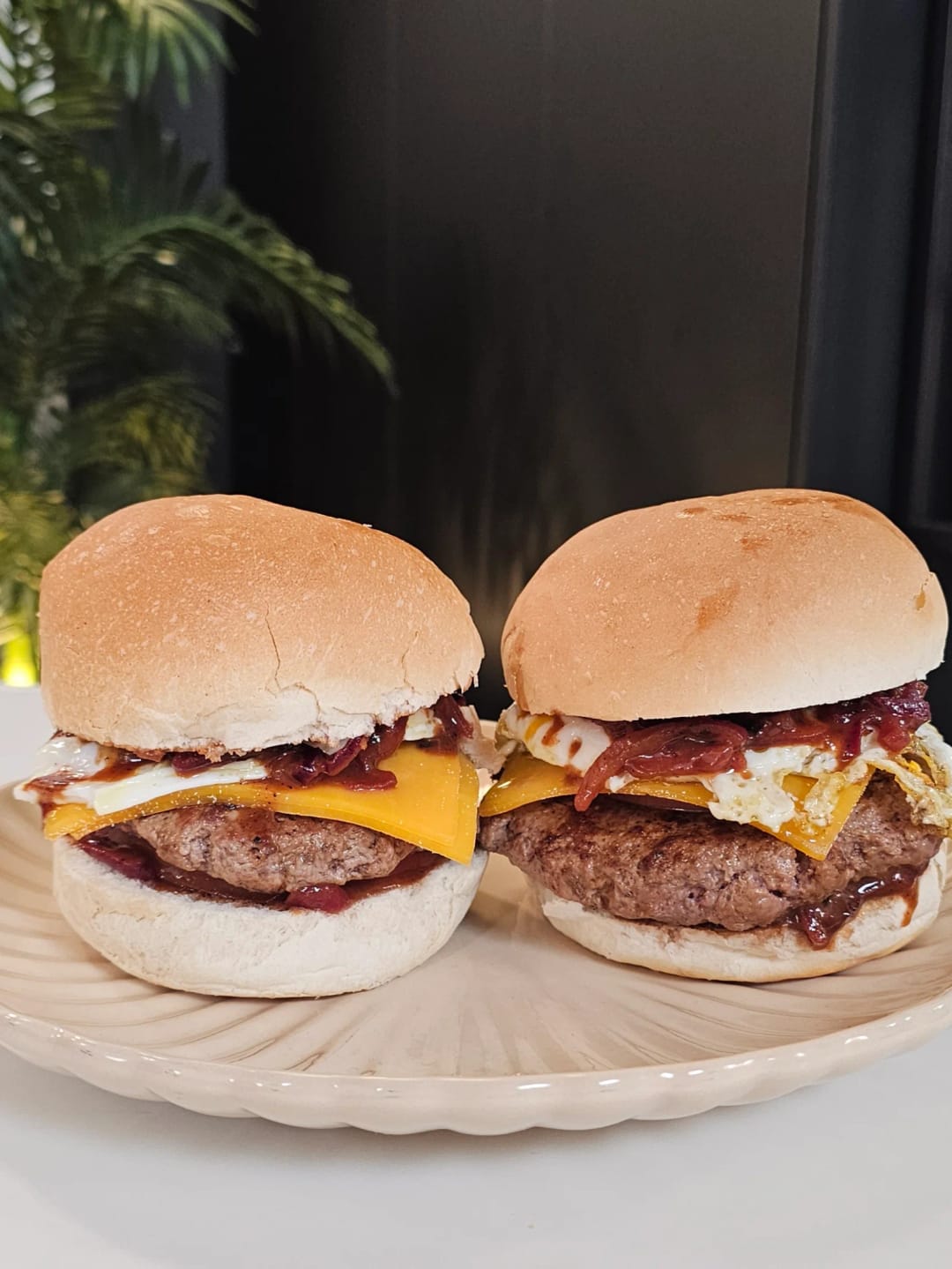 Beef burger with caramelized onions and toppings galore - recipe