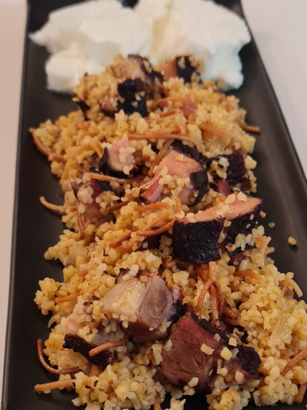 Cracked Wheat with Cured Meat (Pourgouri me Pasto) - Video recipe thumbnail